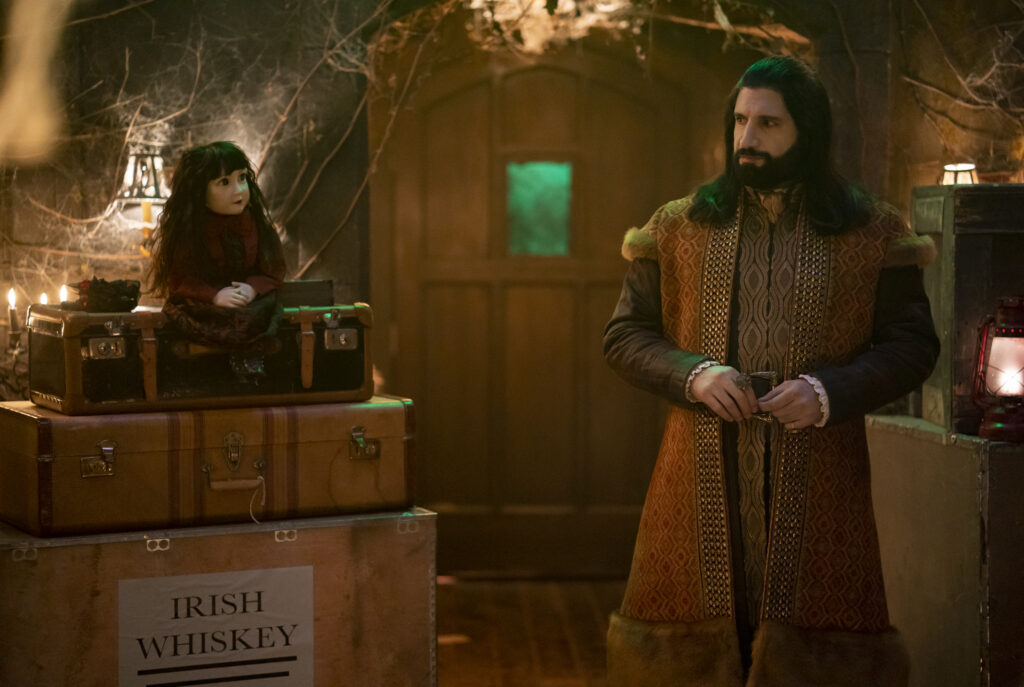 Natasia Demetriou and Kayvan Novak in Jemaine Clement's hit FX comedy-horror fantasy mockumentary series, What We Do in the Shadows Season 4 Episode 1