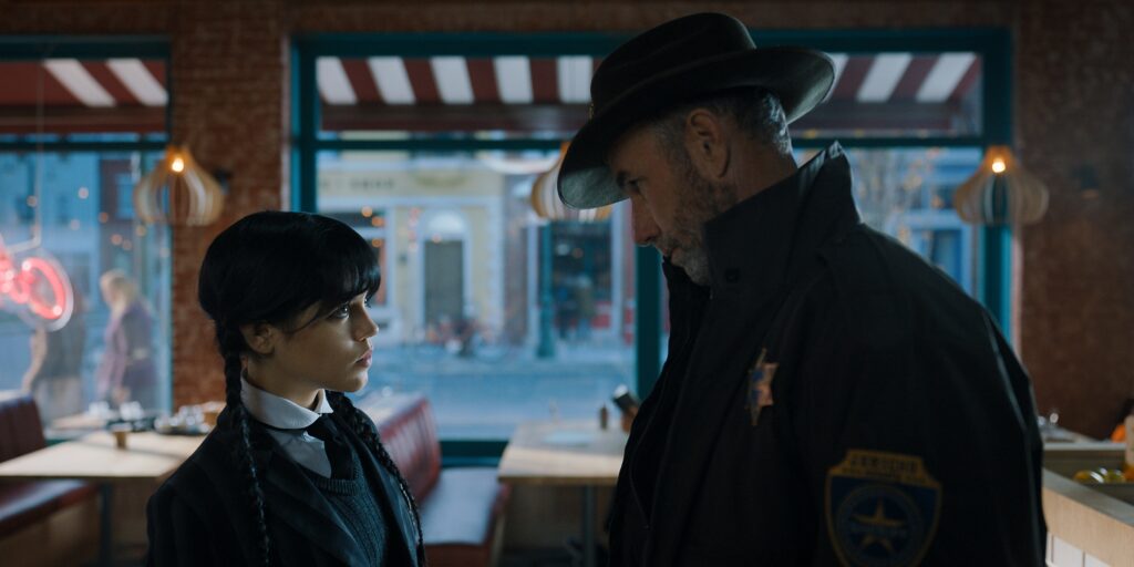 Jenna Ortega and Jamie McShane in Alfred Gough and Miles Millar's Netflix crime comedy supernatural horror series, Wednesday, Season 1 Episode 6