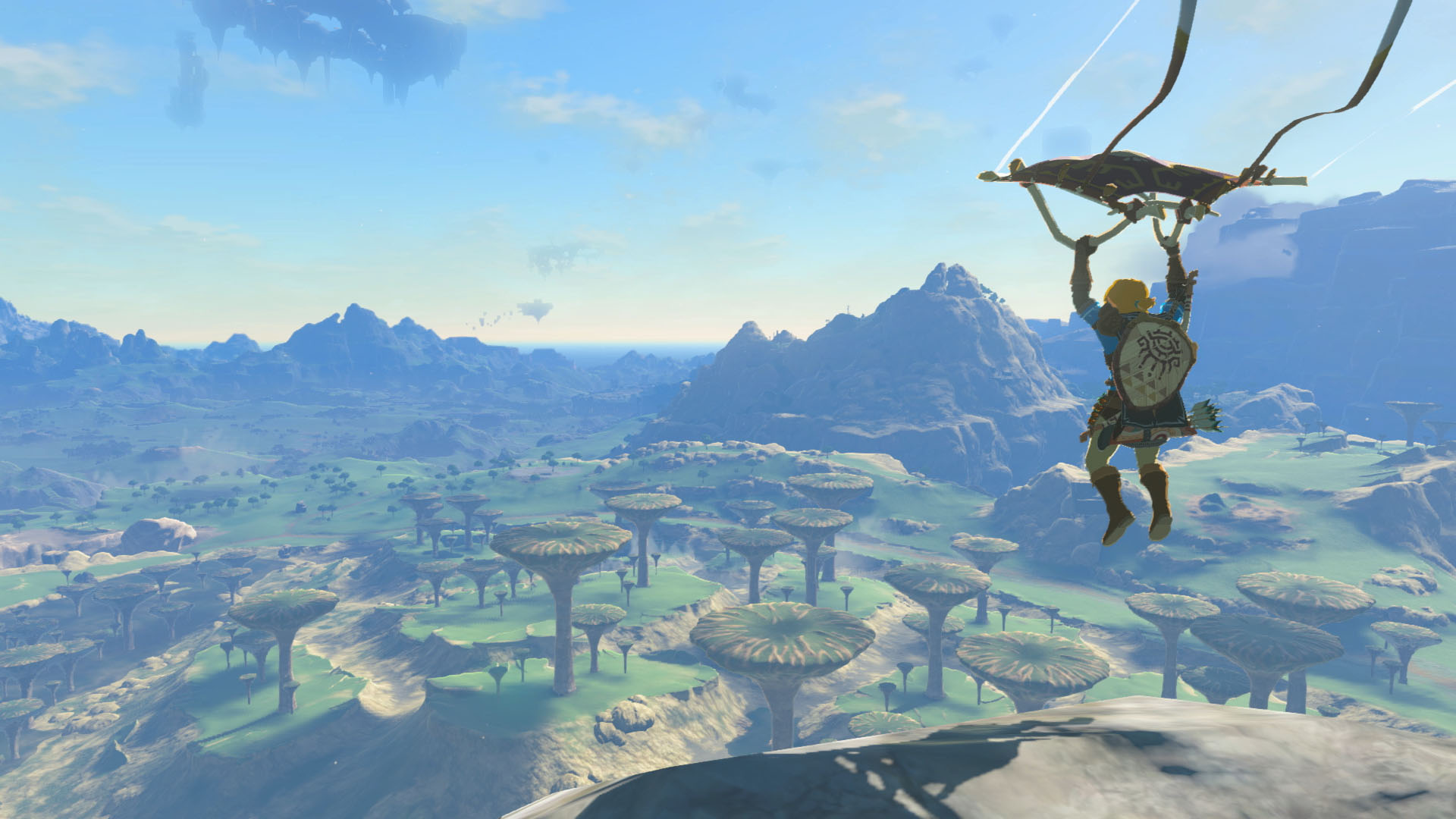 Link floating down from a Sky Island in The Legend of Zelda: Tears of the Kingdom. 