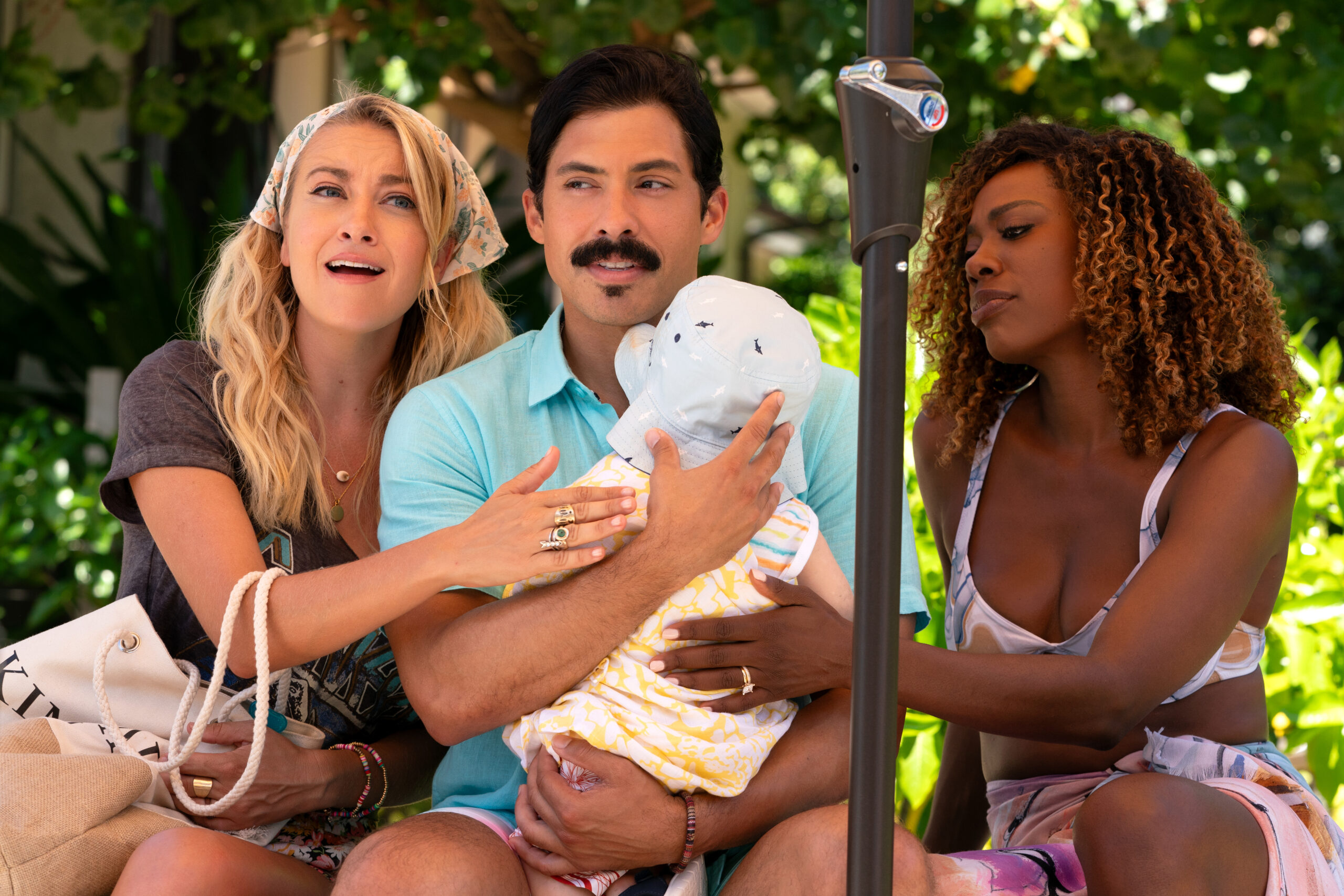 Meredith Hagner, Carlos Santos, and Yvonne Orji in Clay Tarver's Hulu action adventure comedy film, Vacation Friends 2