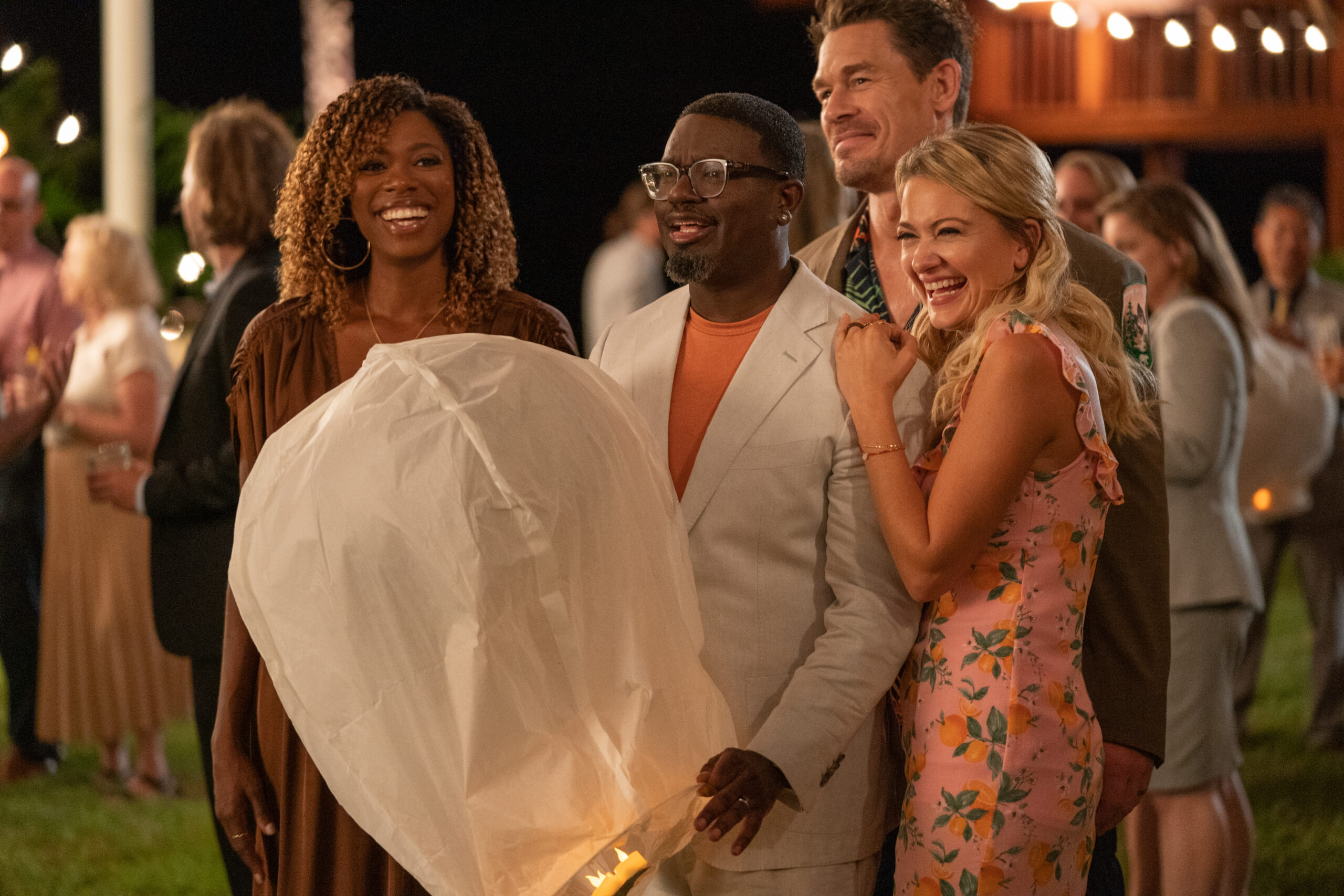 Yvonne Orji, Lil Rel Howery, John Cena, and Meredith Hagner in Clay Tarver's Hulu action adventure comedy film, Vacation Friends 2