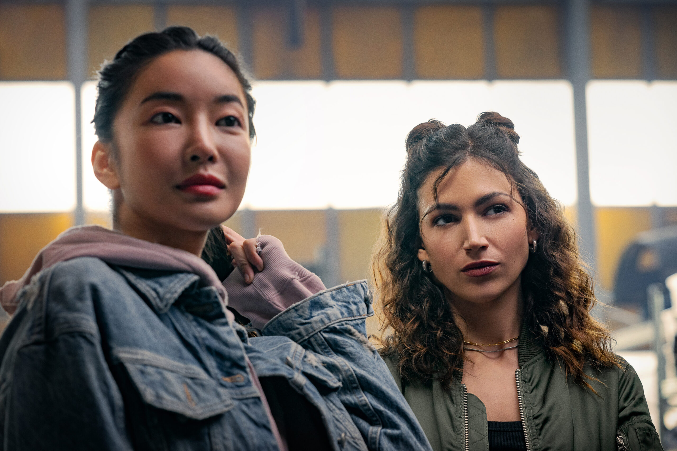 Yun Jee Kim and Úrsula Corberó in F. Gary Gray's action heist crime comedy Netflix film, Lift.