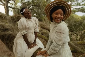Phylicia Peal Mpasi and Halle Bailey as Young Celie and Young Nettie in The Color Purple