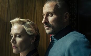 Kate Winslet as Chancellor Elena Vernham and Matthias Schoenaerts as Corporal Herbert Zubak in Will Tracy's HBO political drama satire limited series, The Regime