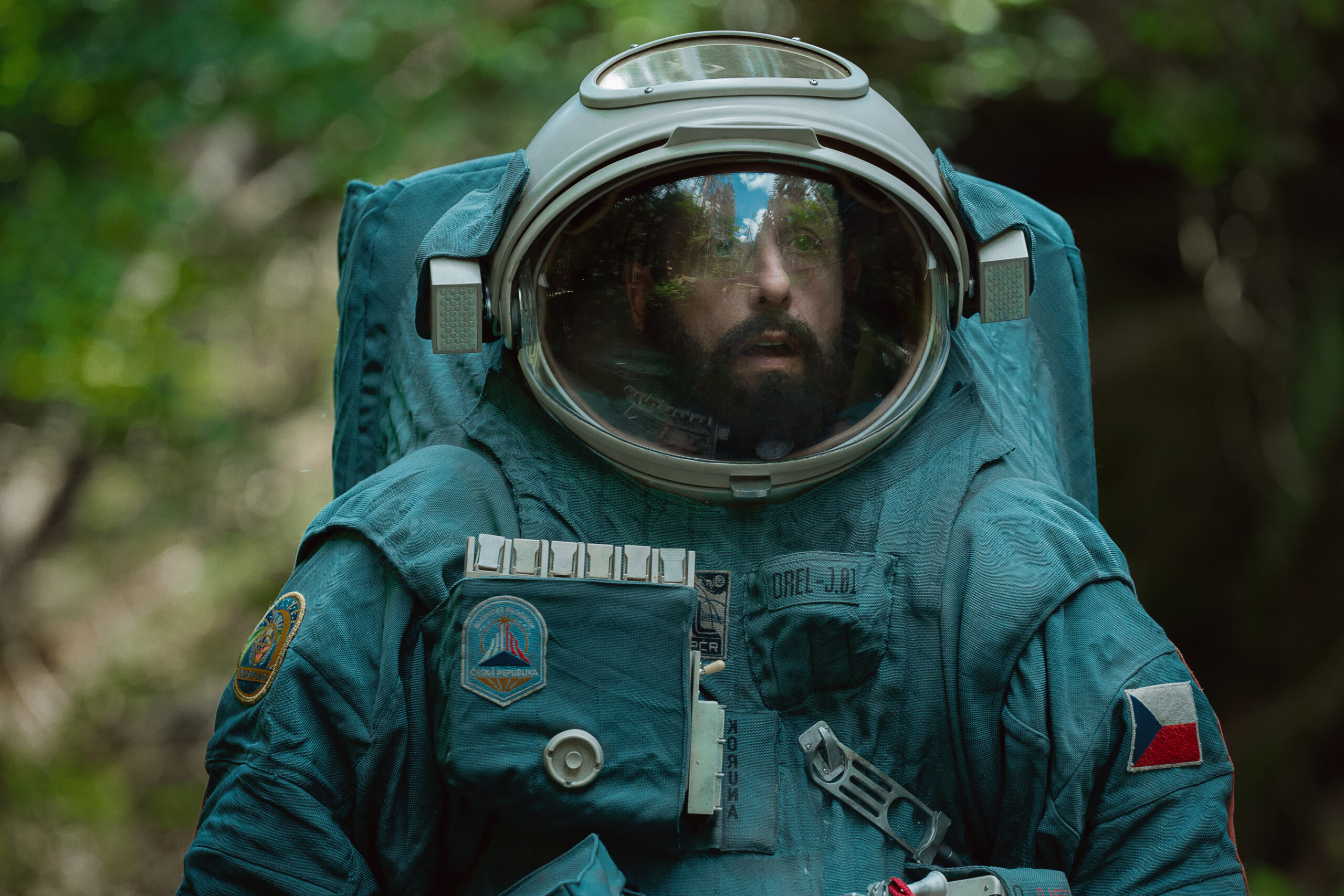 Adam Sandler as Jakub Prochazka in Johan Renck and Colby Day's Netflix science fiction adventure drama film adaptation, Spaceman