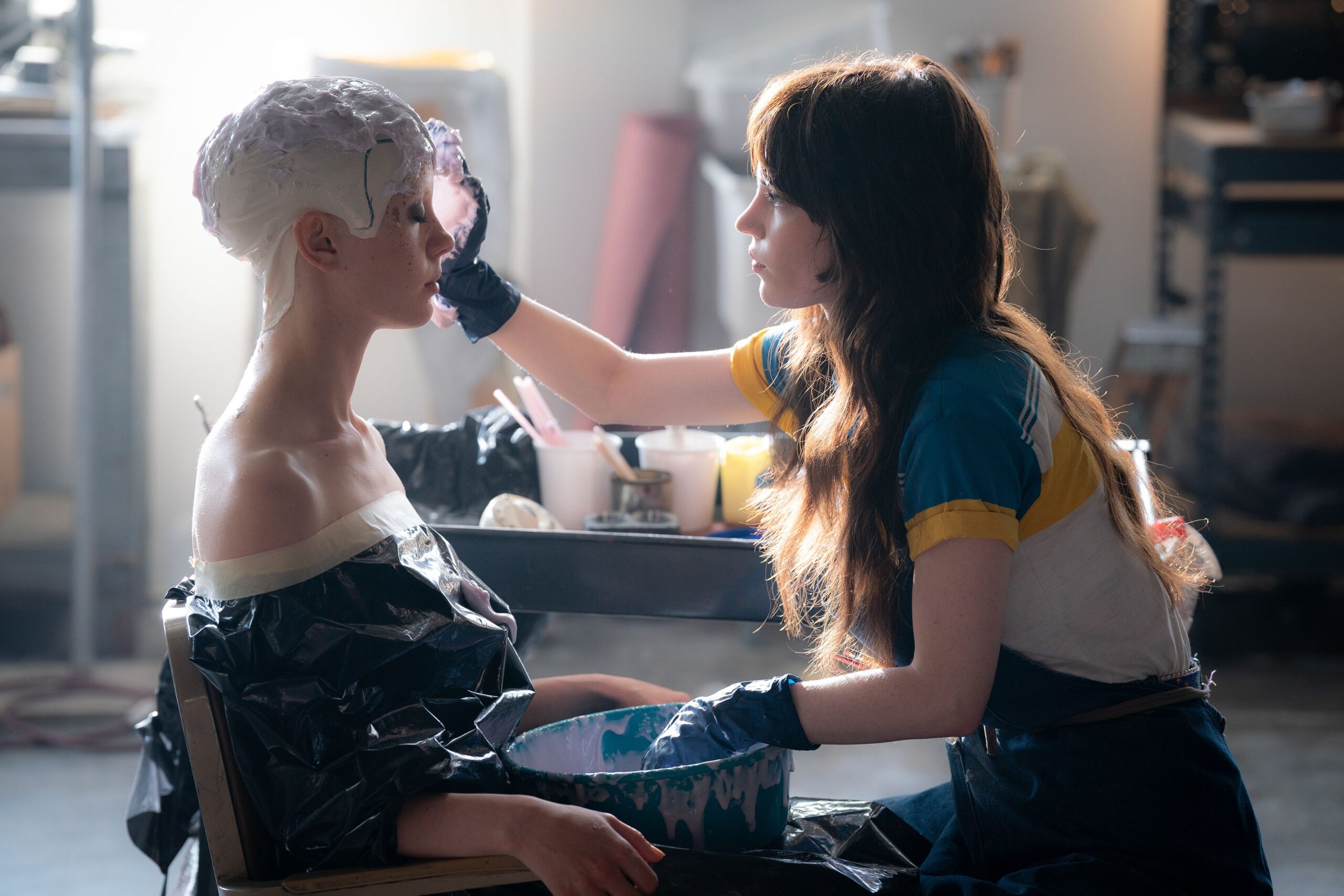 Mia Goth and Sophie Thatcher in Ti West's A24 slasher horror crime film, MaXXXine