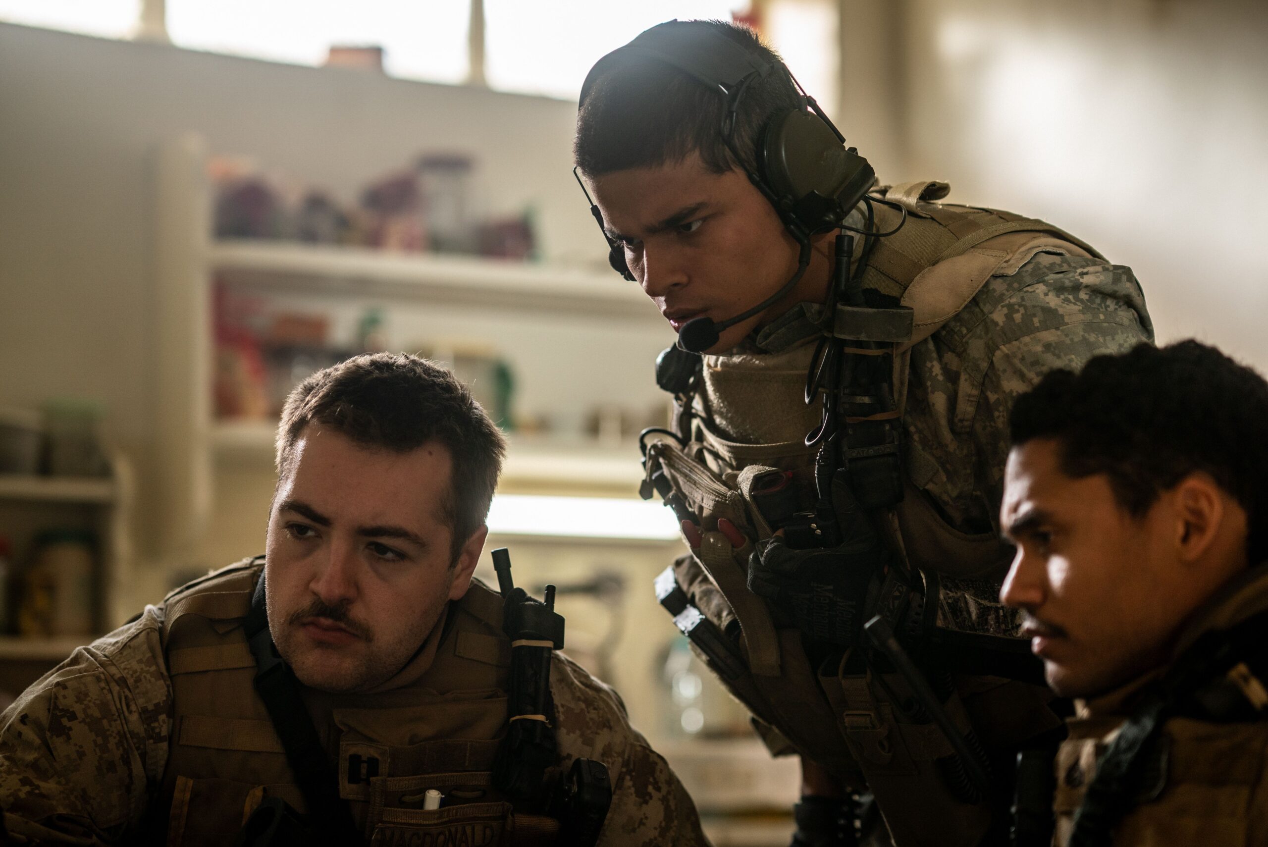 Michael Gandolfini, D'Pharaoh Woon-A-Tai, and Adain Bradley in Ray Mendoza and Alex Garland's A24 action war drama film, Warfare