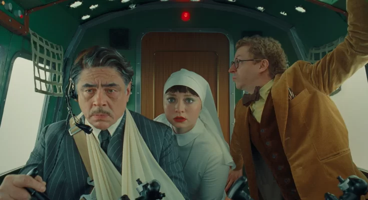 Benicio del Toro, Mia Threapleton, and Michael Cera in Wes Anderson's espionage dark comedy film, The Phoenician Scheme