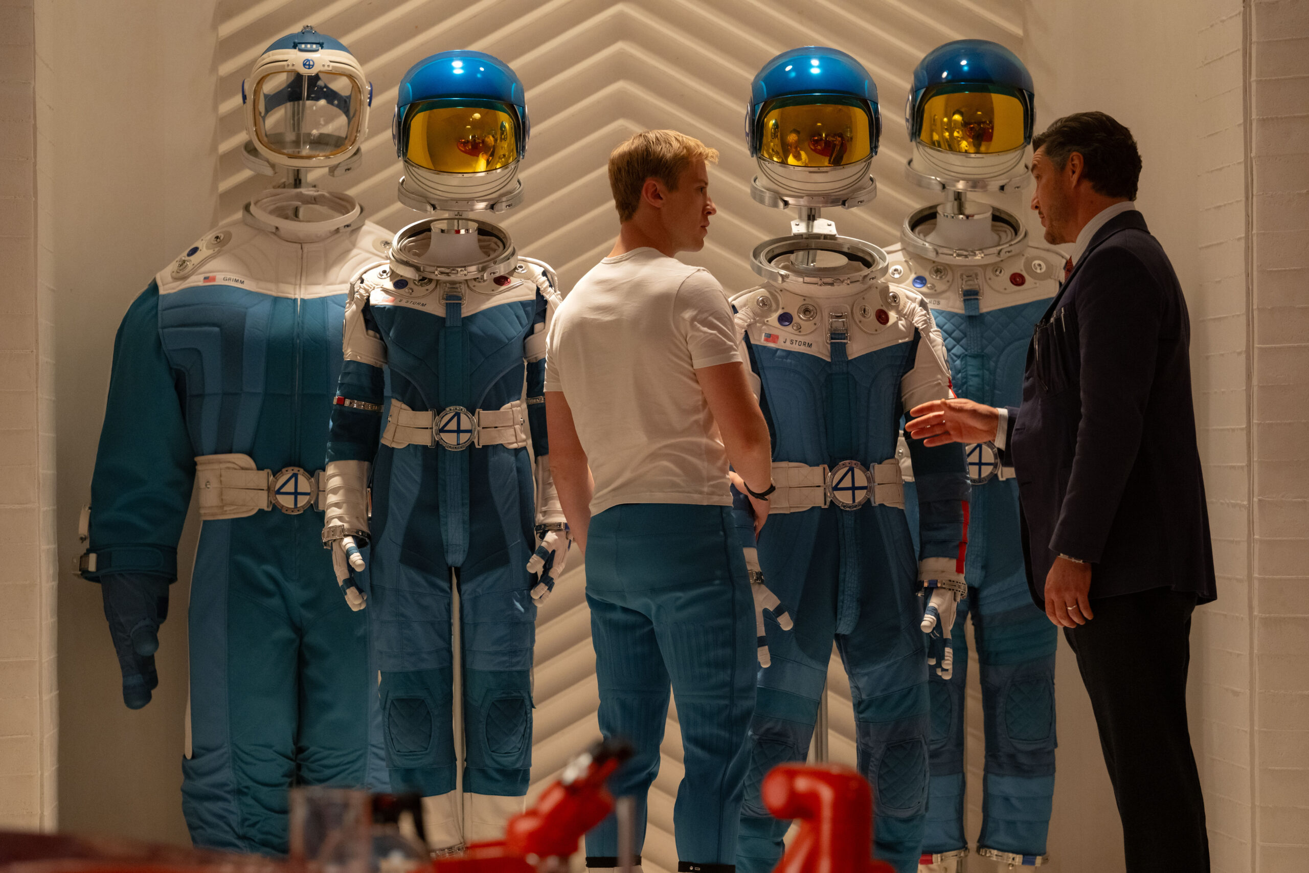 Joseph Quinn as Johnny Storm Human Torch and Pedro Pascal as Reed Richards Mister Fantastic in Matt Shakman, Josh Friedman, Eric Pearson, Jeff Kaplan, Ian Springer, and Kat Wood's action adventure science fiction superhero Marvel Studios film, The Fantastic Four First Steps
