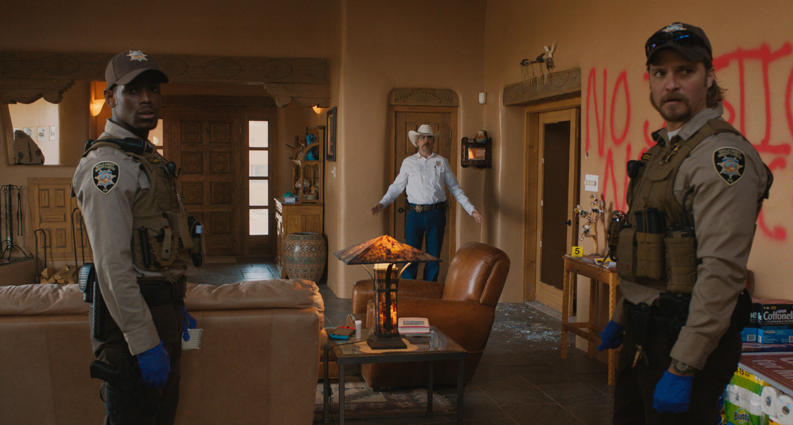 Micheal Ward, Joaquin Phoenix, and Luke Grimes in Ari Aster's neo-Western dark comedy drama A24 film, Eddington