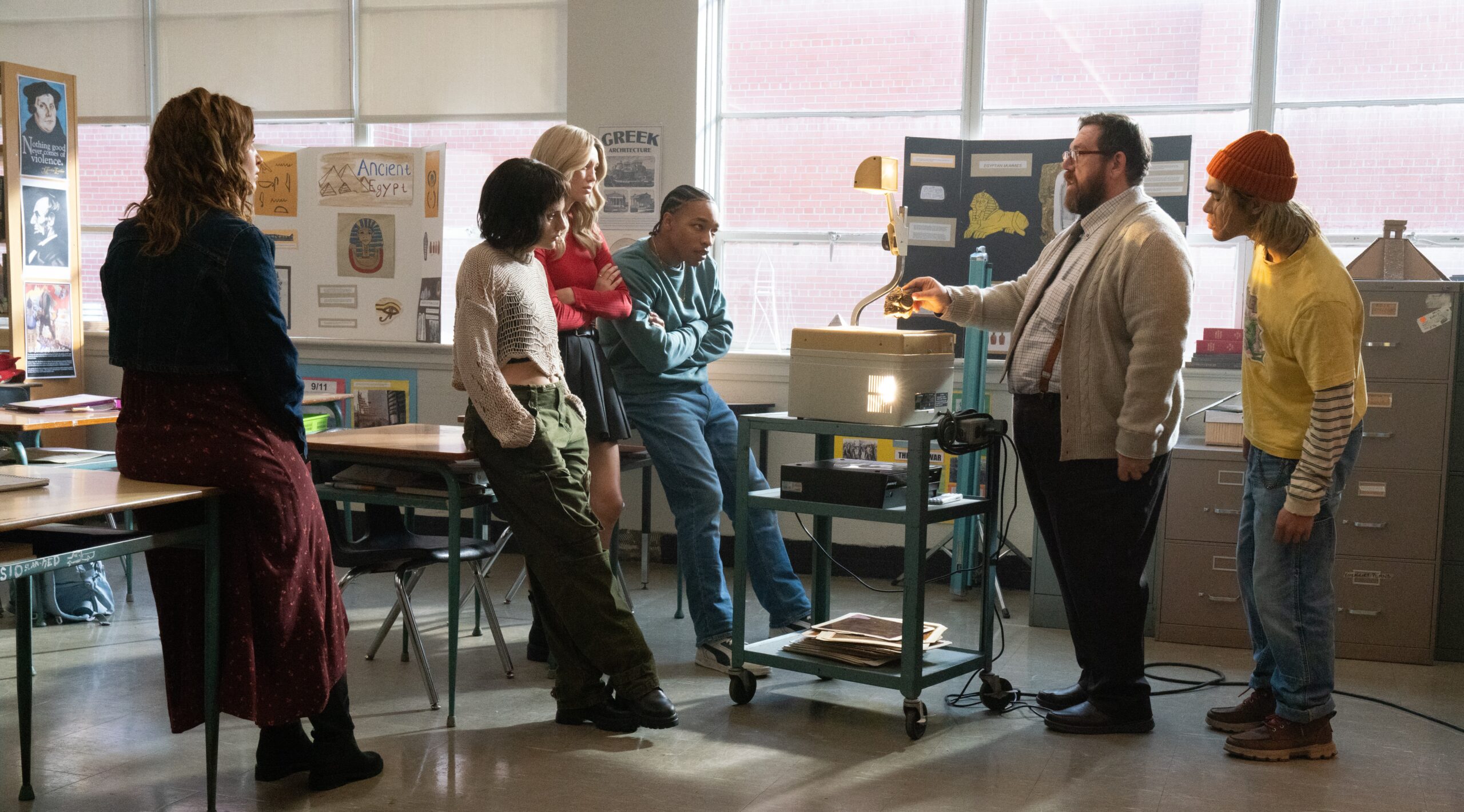 Sophie Nelisse, Dafne Keen, Ali Skovbye, Jhaleil Swaby, Nick Frost, and Sky Yang in Corin Hardy and Owen Egerton's Shudder teen horror film, Whistle