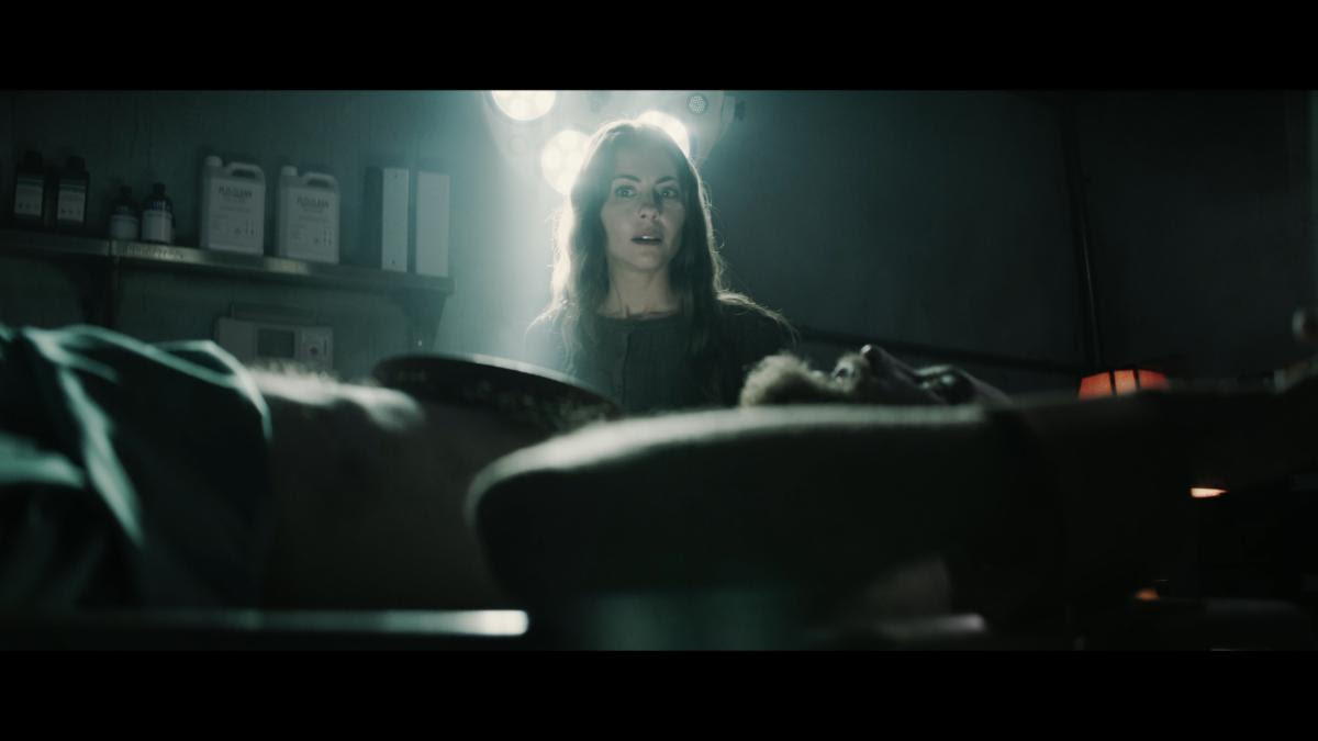 Willa Holland in Jeremiah Kipp, Tracee Beebe, and Brian Clarke's Shudder horror film adaptation, The Mortuary Assistant